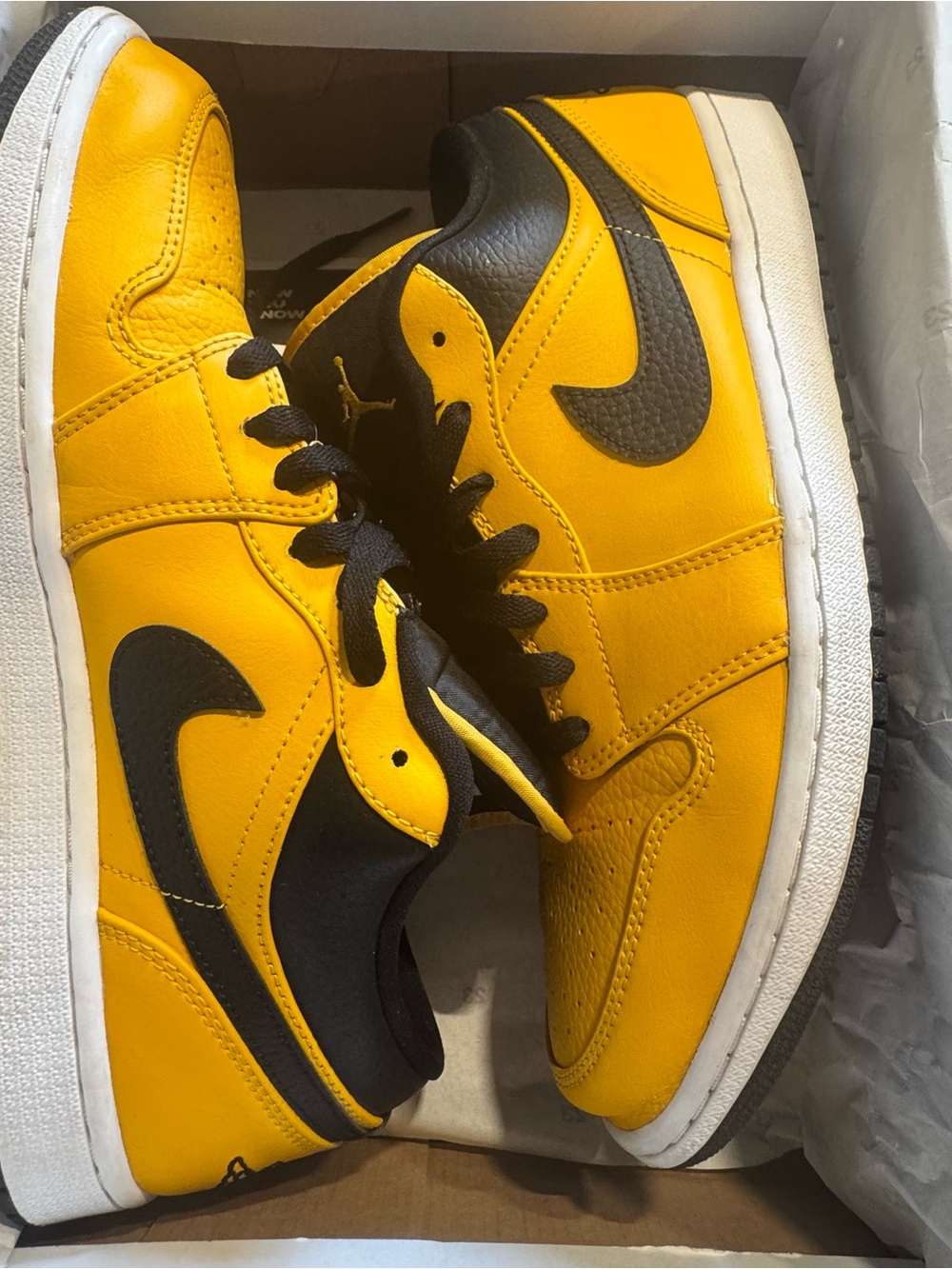 Jordan 1 Low University Gold